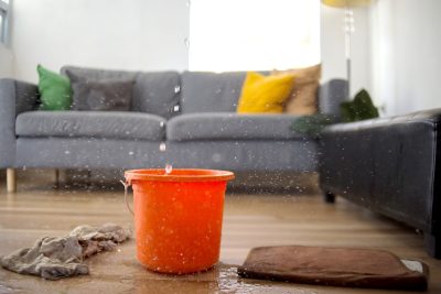 roof leaking inside bucket catching water